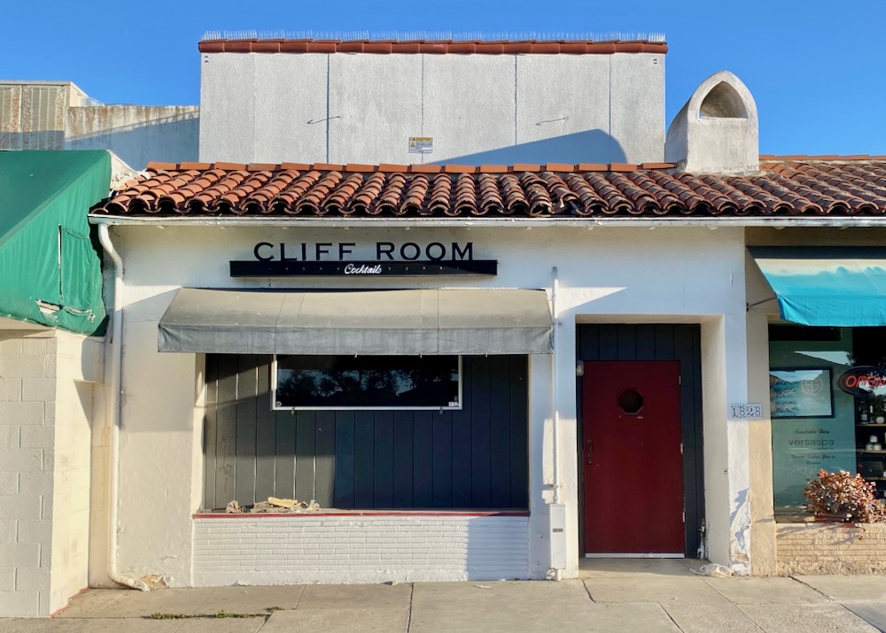 The Cliff Room bar interior in Santa Barbara showing the rustic sports lounge atmosphere and seating